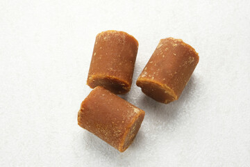 Cylindrical Brown palm sugar, food ingredient
