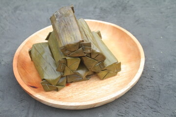 Lontong is an Indonesian dish made of rolled rice, cylindrical lontong wrapped in banana leaves