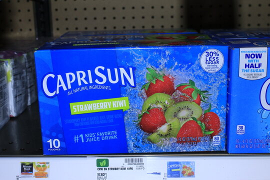 CAPRI SUN Strawberry KIWI in Pouches  in boxes on a shelf 