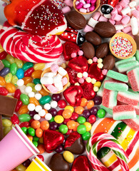 Fototapeta na wymiar Various sweets assortment. Candy, bonbon, chocholate on white background.