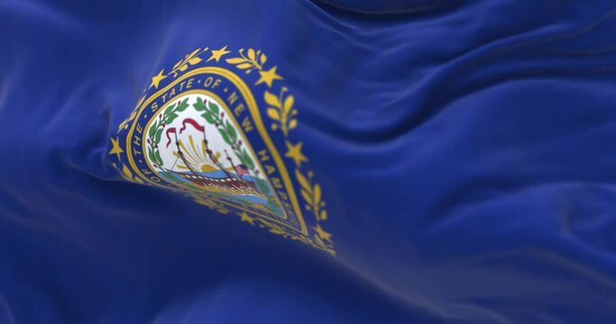Seamless loop in slow motion of New Hampshire state flag waving