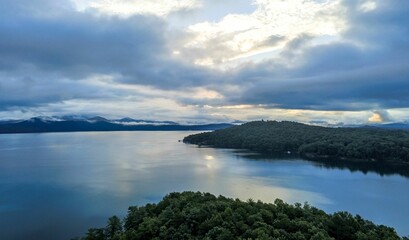 Drone view of Lake Jocassee surrounded by hills and forests in South Carolina, USA