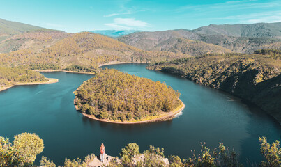 Impressive Melero meander,  estramadura in Spain and woman tourist looking at majestic panorama view © M.studio