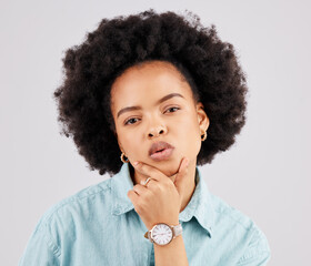 Fashion, beauty and portrait of a black woman in a studio with accessories, pout and positive mindset. Stylish, trendy and headshot of serious African female model posing isolated by gray background.