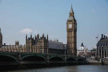 Fototapeta na wymiar Beautiful shot of the historic bridge and Big Ben near the water in London, United Kingdom