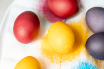 Painted eggs on the table after painting, a symbol of Easter, eggs