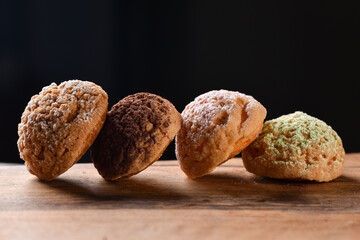 Fresh french cookies dessert on the wooden plate