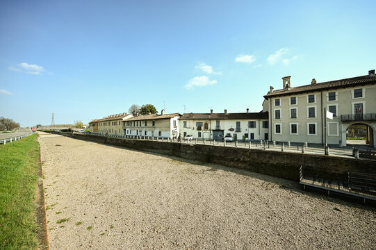 The dry riverbed of  Naviglio Grande canal during bank restoration works in Abbiategrasso, Milan, Italy on March 23, 2023