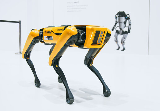 Bangkok, Thailand - Mar 28, 2023: Presentation of Spot, four-legged robot by Hyundai Boston Dynamics in Motor Show exhibition event. Advanced futuristic technology, robotic tech industry expo concept