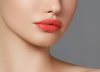 Obraz premium Closeup portrait of beautiful woman with bright make-up and red lips. Attractive model with a red lipstick.