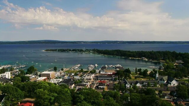 Harbor Springs upward movement downtown summer beautiful scenic Great Lakes Petosky in background