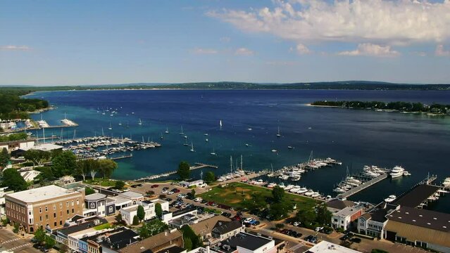 Great Lakes downtown Harbor Springs Michigan backwards movement stunning summer blue day
