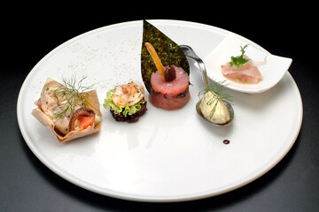 Italian food recipes, seafood appetizer with octopus, shrimps, tuna, stockfish and swordfish