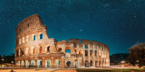 Rome, Italy. Colosseum Also Known As Flavian Amphitheatre In Evening Or Night Time. Travel Italy....