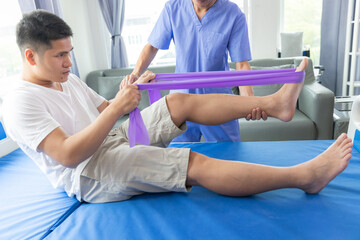 Fototapeta premium Physiotherapist working with patients in clinic,