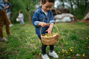 child with basket play in a courtyard