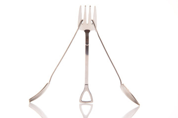 decorative fork and spoons in the form of spades on a white background. food tools.