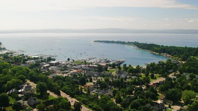 Pan up Harbor Springs Great Lakes Up North Drone forward movement beautiful summer day