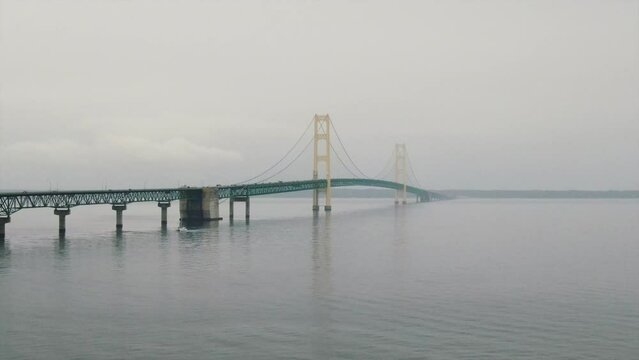 Mackinaw Bridge Fog Rain peaceful cars crossing Zoom pan right spin Great Lakes up north Michigan summer