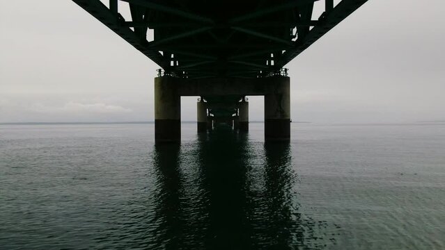 Mackinaw Bridge underneath slowly forward Fog Rain peaceful  Great Lakes up north Michigan summer