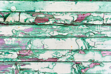 Vintage wood background with peeling paint. old wooden painted background in green color.