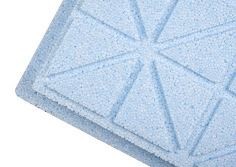 Blue styrofoam plate with visible grooves.