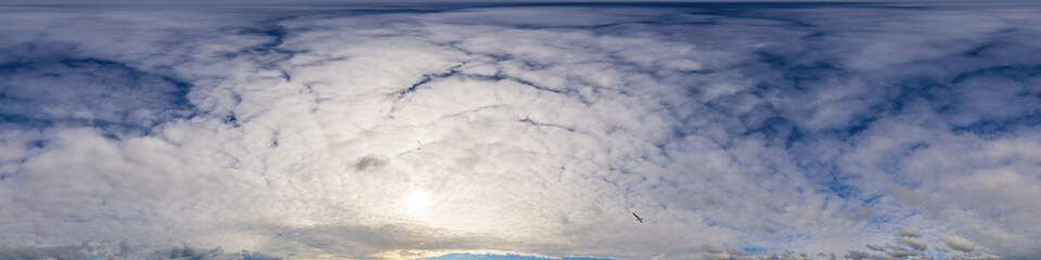 Blue sky panorama with puffy Cumulus clouds. Seamless hdr pano in spherical equirectangular format. Sky dome or zenith for 3D visualization, game and sky replacement for aerial drone 360 panoramas.