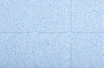 Blue styrofoam plate with visible grooves.