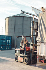 Man working on a forklift