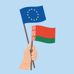 Flags of EU and Belarus, Hand Holding flags