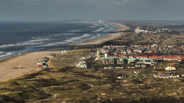 Drone view of Katwijk and Noordwijk on coastline, Zandvoort and IJmuiden in back