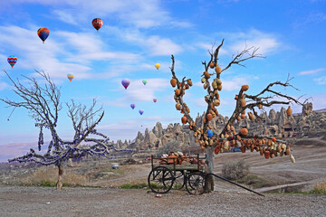 Fototapeta na wymiar Hot air balloon flying over spectacular Cappadocia, Uchisar - Goreme, Turkey 