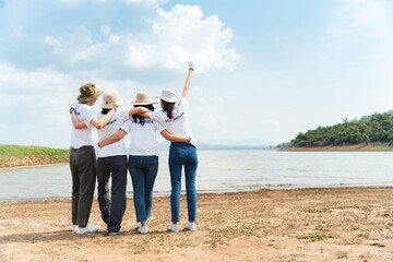 Group of asian diverse people volunteer teamwork joining charity event to cleaning up garbage on public area ,Unity and team spirit on world environment day.