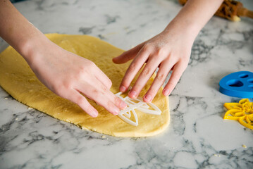 hands of a child baking