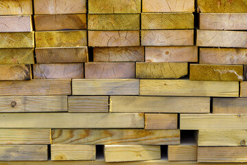 Background of pine building boards with wood texture. Lumber for construction