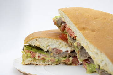 delicious churrasco sandwich, with tomato, avocado mayonnaise