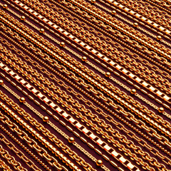 Different types of Gold chains arranged on a velvet cloth.