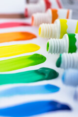 Rainbow brushstrokes with close-up paint. Paints on a white background