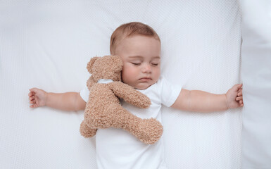Cute little baby boy slipping