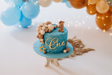 Photo zone for the first cake in blue and coffee colors. The blue cake is delicious and aesthetically beautiful