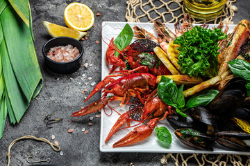 seafood set. A plate full of cooked shrimp, fish, crayfish, mussels. banner, menu, recipe place for...