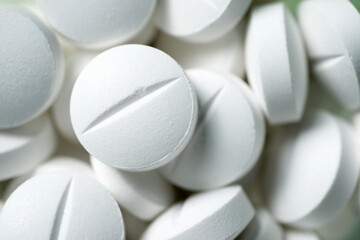 Close-up of white medicine pills