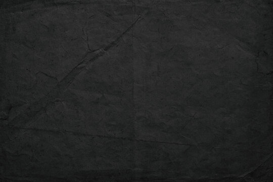 black paper texture or concrete wall as background