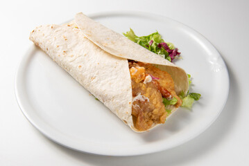 piadina with chicken , tomato and salad, isolated on white background