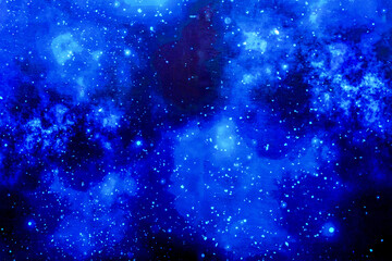 Blue cosmic abstract background with light spots of nebulae and white dots of stars.