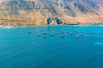 Aerial view of fishing boats in the coasts of Iquique, Chile