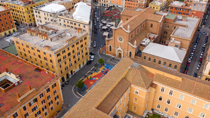 Fototapeta premium Aerial view of the church of St. Mary Immaculate and St. John Berchmans in the Immaculate Square. It is a place of Catholic worship located in the San Lorenzo district, Rome, Italy.