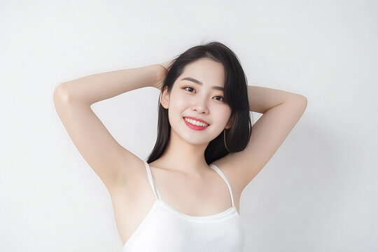 Portrait of Cute Asian Woman, She raises her arm to show her Smooth armpit skin and looks at the camera on a White background in Studio light. generative AI. generative AI