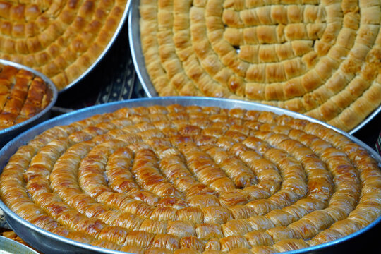 Homemade baklava with walnut in tray, tepside ev yapımı cevizli baklava            