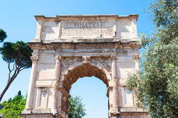 The Arch of Titus,  located on the Via Sacra, Rome, Italy. It is a triumphal arch commemorates the...